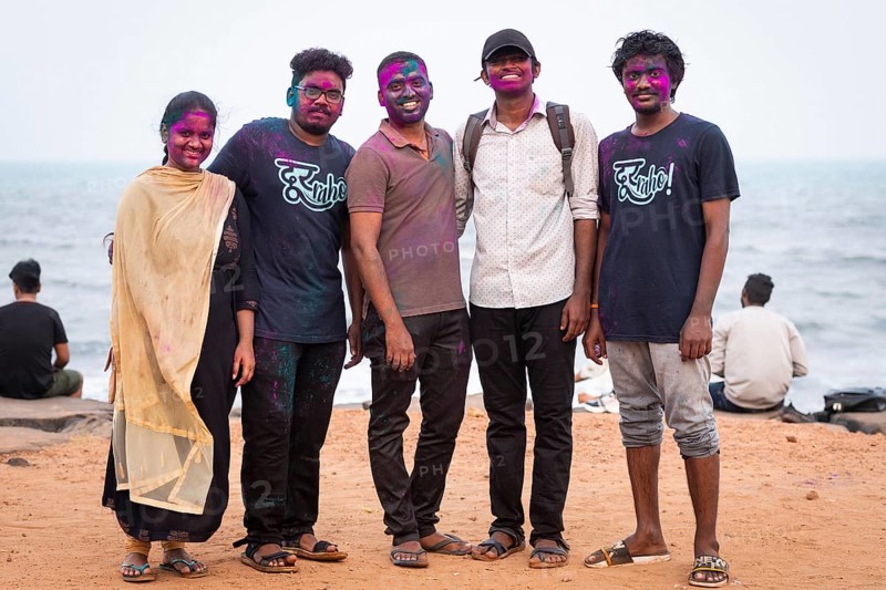Group of young people with colour on their faces, Holi Festival, Indian spring festival, traditional festival of colours, Pondicherry or Puducherry, Tamil Nadu, India, Asia
