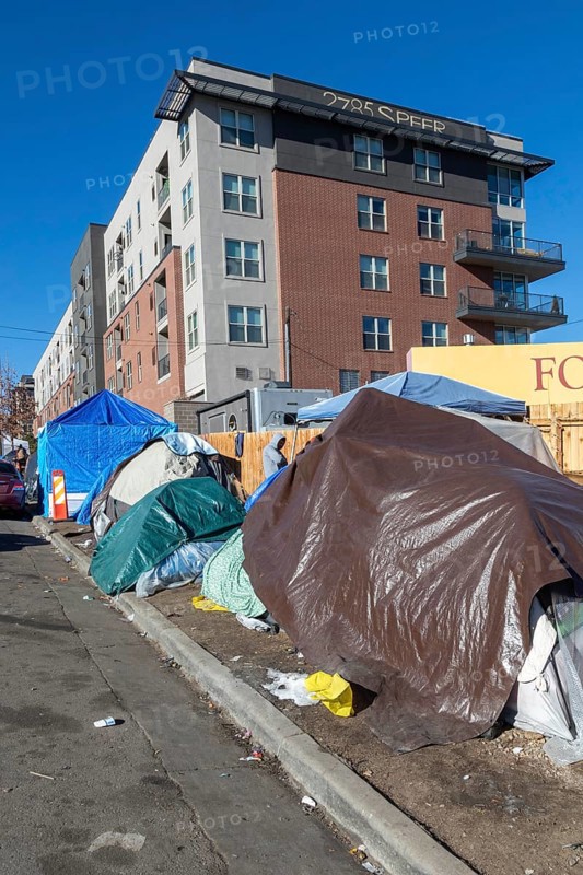 Denver, Colorado, Immigrants, mostly from Venezuela, live in a tent camp near downtown Denver. The city helped about 35, 000 migrants in 2023 with food and temporary shelter, but more continue to arrive daily on buses from the southern border