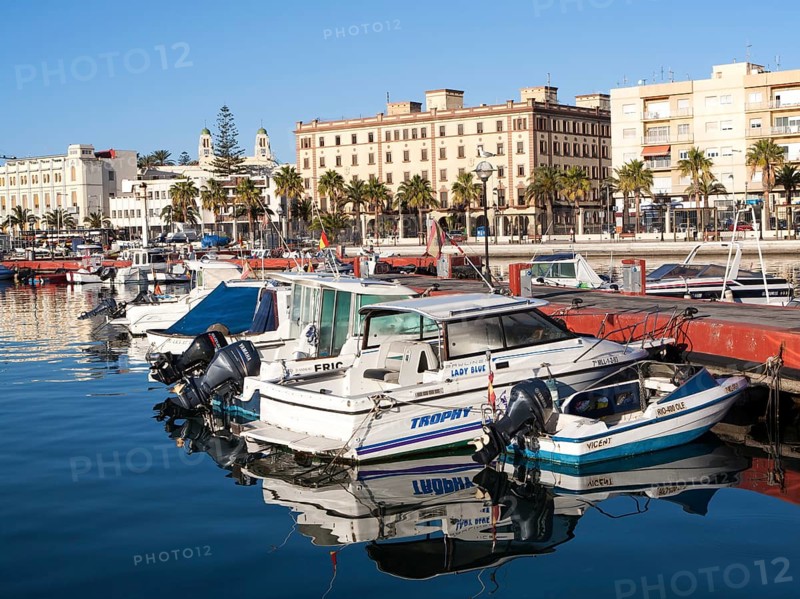 Boats in harbour and town centre buildings, Melilla. Spanish territory in north Africa, Spain, Europe