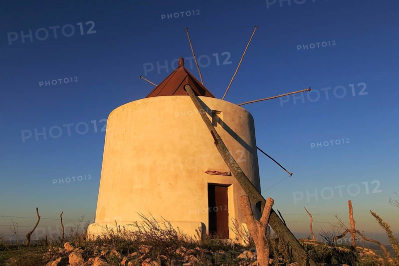Traditional windmill at dusk, Vejer de la Frontera, Cadiz Province, Spain, Europe