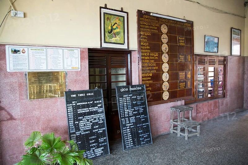 Train timetable at the railway station, Galle, Sri Lanka, Asia