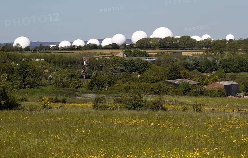 White circular radomes of satellite ground station, RAF Menwith Hill, North Yorkshire, England, UK