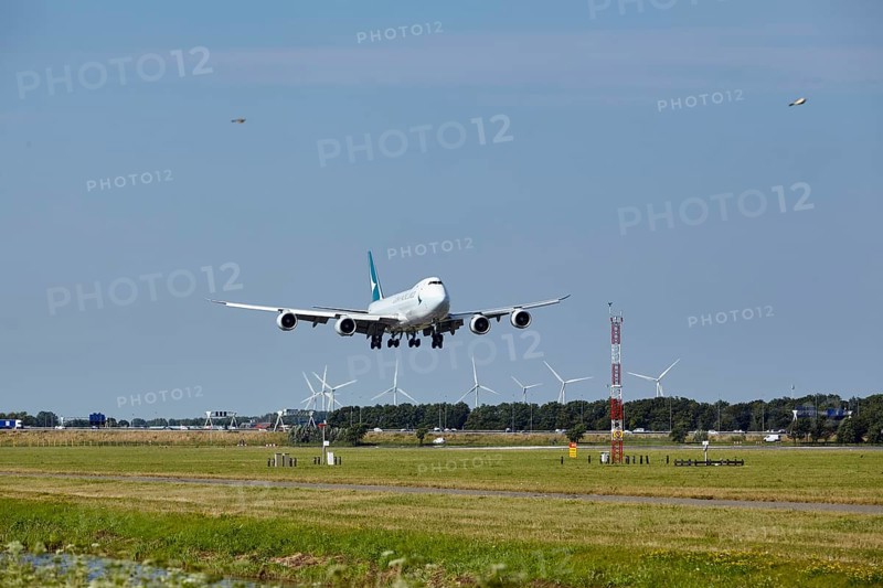 Cathay Pacific Cargo Boeing 747-867F with registration B-LJI lands on the Polderbaan, Amsterdam Schiphol Airport in Vijfhuizen, municipality of Haarlemmermeer, Noord-Holland, Netherlands