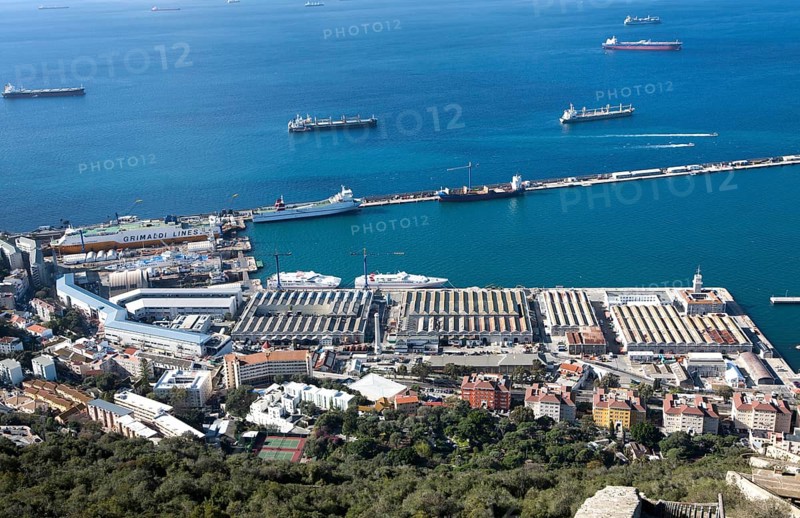 View over docks and shipyard warehouses in Gibraltar, British territory in southern Europe