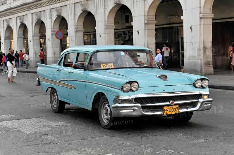 Blue vintage car from the 50s in Avenida Simon Bolivar, Calle Reina, centre of Havana, Centro Habana, Cuba, Greater Antilles, Caribbean, Central America
