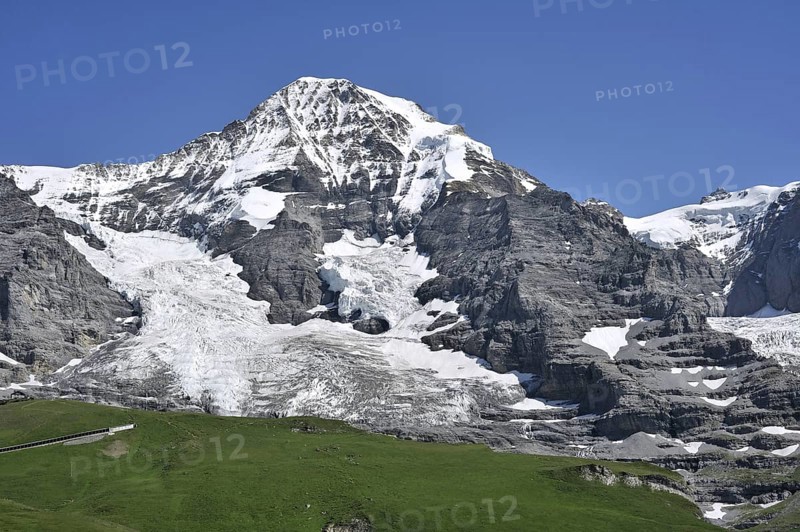 The Moench forms part of a mountain ridge between the Jungfrau and the Eiger in the Bernese Alps, Switzerland, Europe