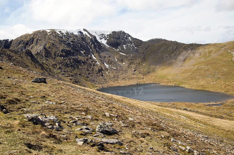 Striding Edge arete Helvellyn mountain peak and Red Tarn corrie lake, Lake District, Cumbria, England, UK