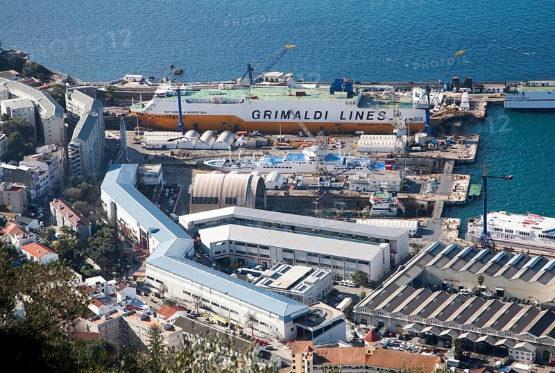 View over docks and shipyard warehouses in Gibraltar, British territory in southern Europe