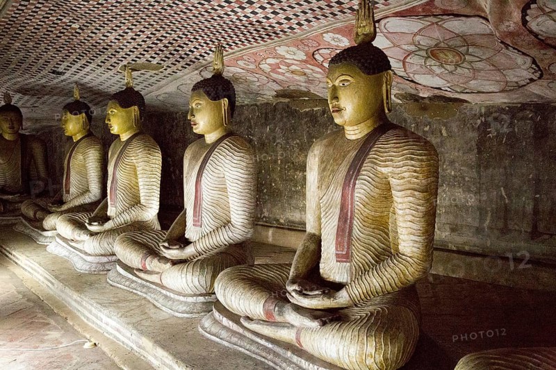 Buddha figures inside Dambulla cave Buddhist temple complex, Sri Lanka, Asia