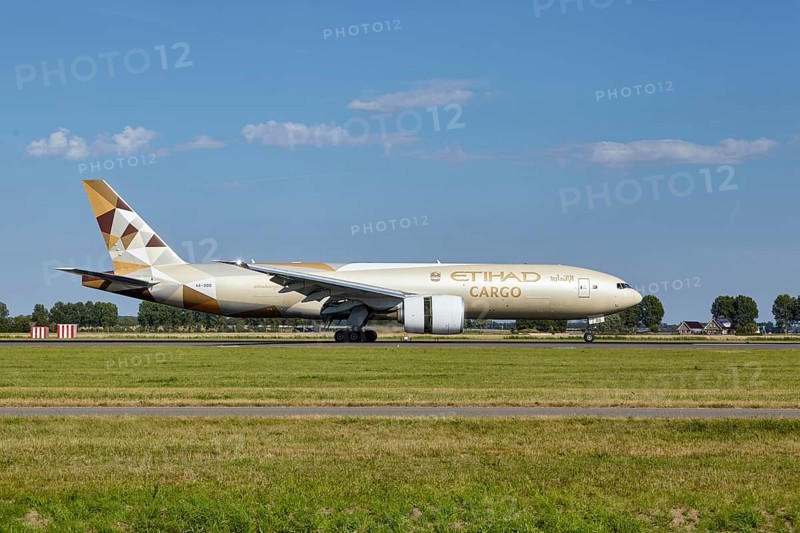 Etihad Cargo Boeing 777-FFX with registration A6-DDD lands on the Polderbaan, Amsterdam Schiphol Airport in Vijfhuizen, municipality of Haarlemmermeer, Noord-Holland, Netherlands