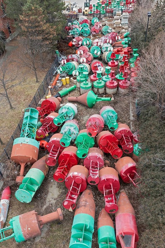Detroit, Michigan, Navigational buoys stored at the U.S. Coast Guard station. The buoys mark the shipping channel from Saginaw Bay in Lake Huron through the St. Clair River, Lake St. Clair, and the Detroit River to Lake Erie. Many buoys are removed from the water and stored at the Coast Guard station for the winter