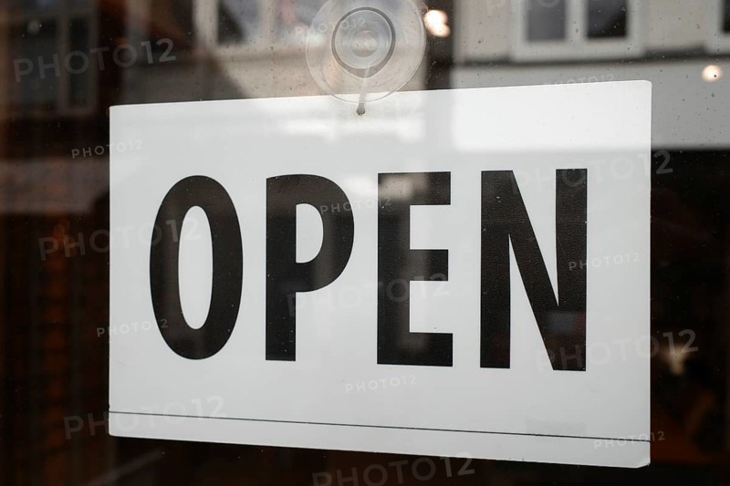 Sign with inscription Open, Haarlem, Netherlands