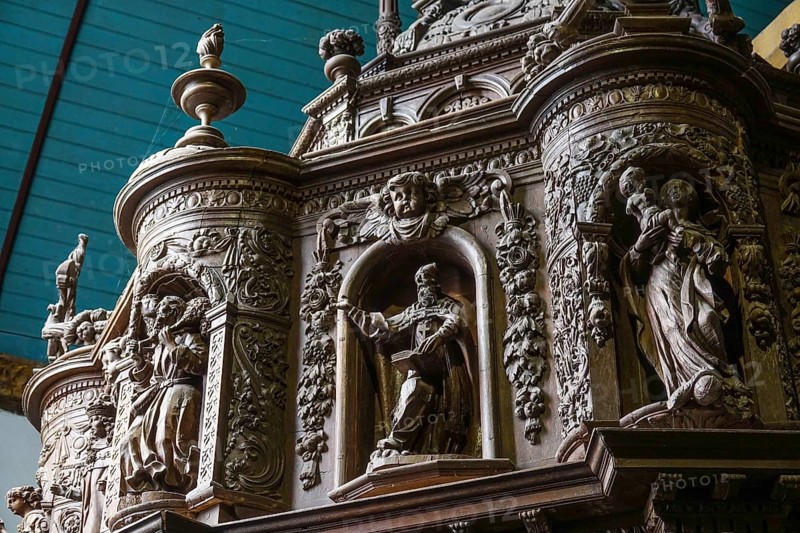 Renaissance-style carved canopy of the baptismal font, Enclos Paroissial enclosed parish of Guimiliau, Finistere Penn ar Bed department, Brittany Breizh region, France, Europe