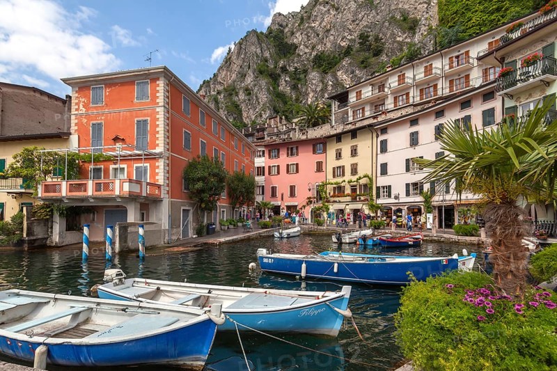 Houses and fishing boats in the old harbour of Limone sul Garda, Lake Garda, Province of Brescia, Lombardy, Upper Italy, Italy, Europe