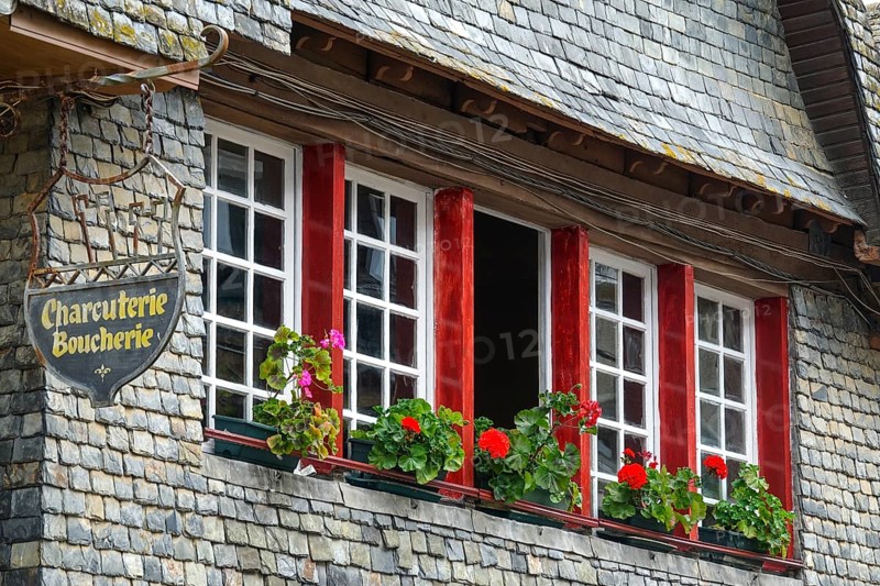 Rue du General de Gaulle in the old town centre of Le Faou with slate-roofed granite houses from the 16th century, Finistere department, Brittany region, France, Europe