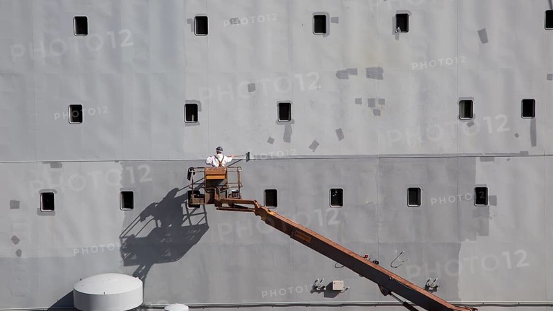 RFA Mounts Bay ship in dry dock being painted, Falmouth, Cornwall, England, UK