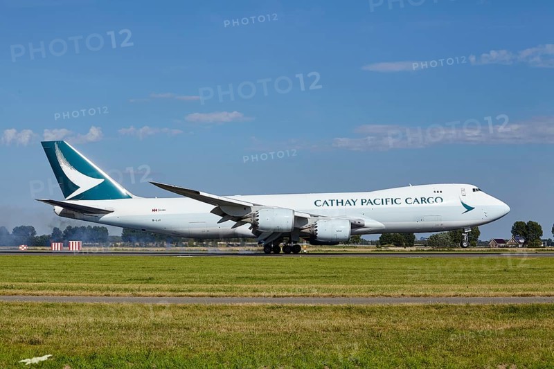 Cathay Pacific Cargo Boeing 747-867F with registration B-LJI lands on the Polderbaan, Amsterdam Schiphol Airport in Vijfhuizen, municipality of Haarlemmermeer, Noord-Holland, Netherlands