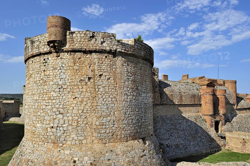Moat and ramparts of the Catalan fortress Fort de Salses at Salses-le-Chateau, Pyrenees, France, Europe