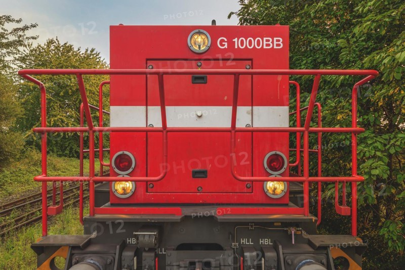 Front view of a red locomotive with headlights and metal grille, Lower Rhine, North Rhine-Westphalia, Germany, Europe
