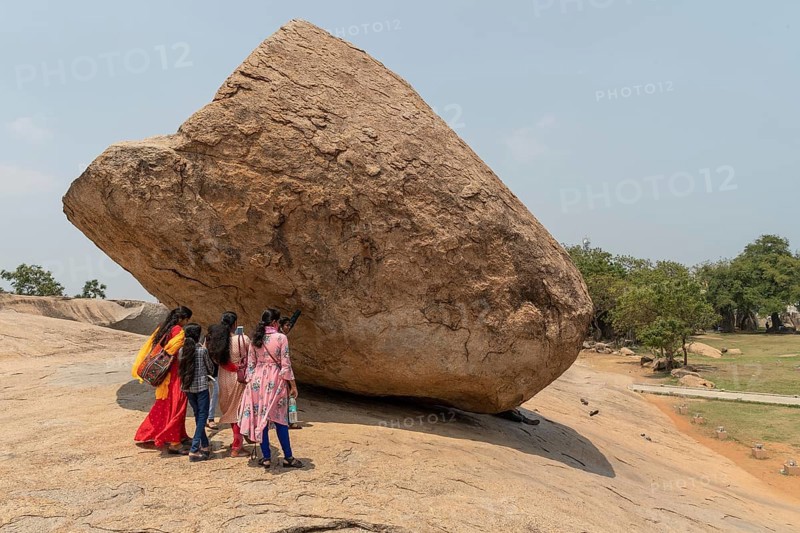 Indian tourists, Krishna's butterball, natural boulder, UNESCO World Heritage Site, Mahabalipuram or Mamallapuram, Tamil Nadu, India, Asia