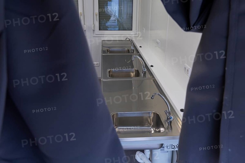 Press event in front of the commissioning of the residential containers for refugees at Sachsenplatz, Johannstadt for 72 people. Shared kitchen, Dresden, Saxony, Germany, Europe