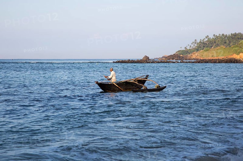 Fishing using traditional outrigger canoes, Mirissa, Sri Lanka, Asia