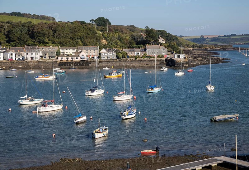 Yachts at moorings on River Fal, Flushing, Cornwall, England, UK