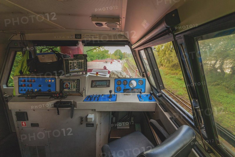 Interior view of an engine driver's cab with controls and view through the window, Lower Rhine, North Rhine-Westphalia, Germany, Europe