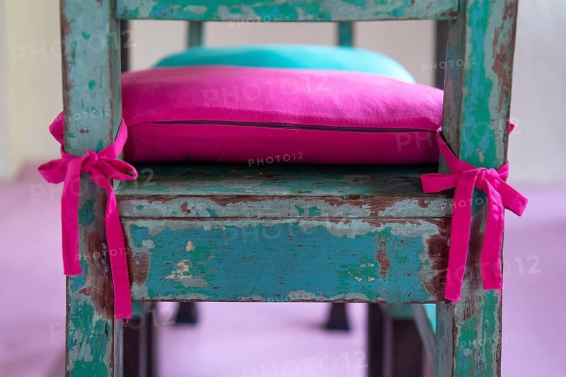 Pink cushion on a green wooden chair, Pondicherry or Puducherry, Tamil Nadu, India, Asia