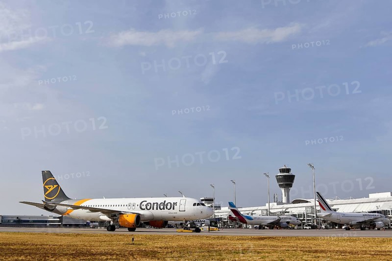 Overview Condor Airbus A320, Air France and Eurowings aircraft at check-in position at Terminal 1 with control tower, Munich Airport, Upper Bavaria, Bavaria, Germany, Europe