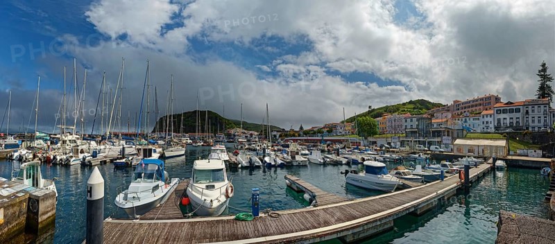 Lively harbour of Horta with many boats and surrounding mountains, Horta, Faial Island, Azores, Portugal, Europe