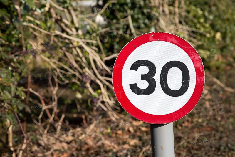 Close-up of thirty miles per hour speed limit sign, UK