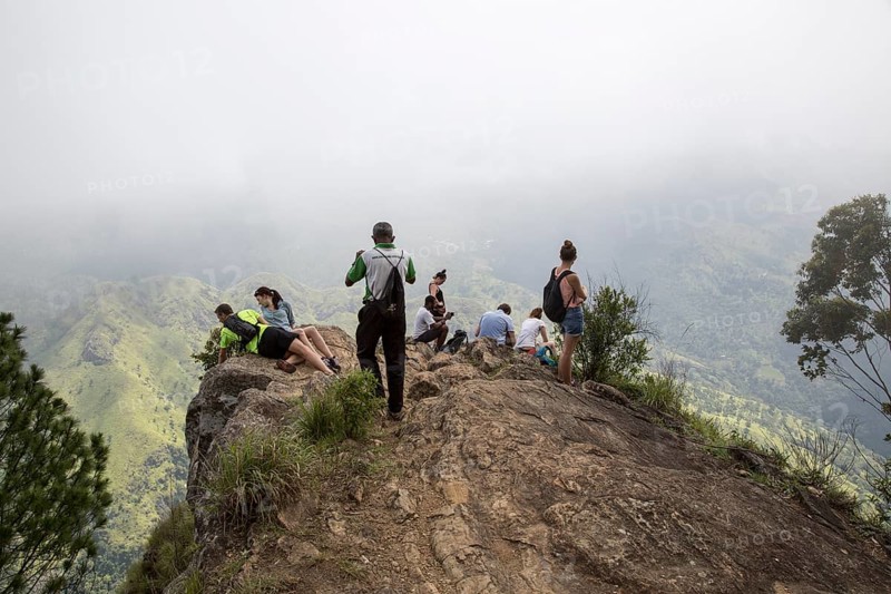 Walkers on the peak of Ella Rock mountain, Ella, Badulla District, Uva Province, Sri Lanka, Asia