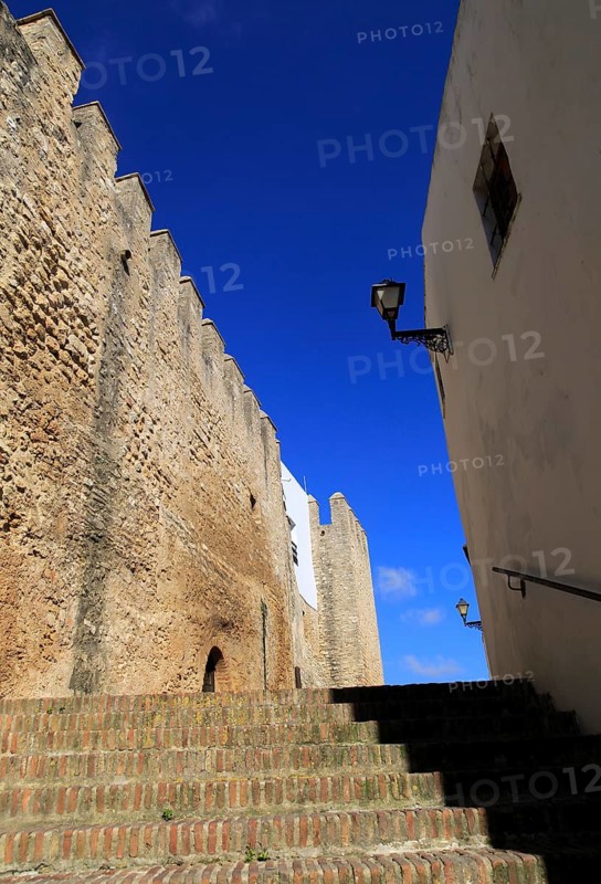 Historic street and castle walls in the village of Vejer de la Frontera, Cadiz Province, Spain, Europe