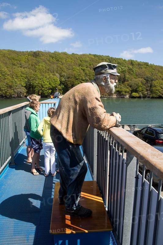 Sculpture of an Old Man on the King Harry Ferry Bridge vehicular chain ferry crossing River Fal, Cornwall, England, UK