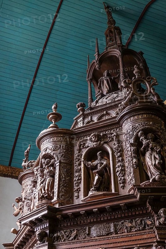 Renaissance-style carved canopy of the baptismal font, Enclos Paroissial enclosed parish of Guimiliau, Finistere Penn ar Bed department, Brittany Breizh region, France, Europe