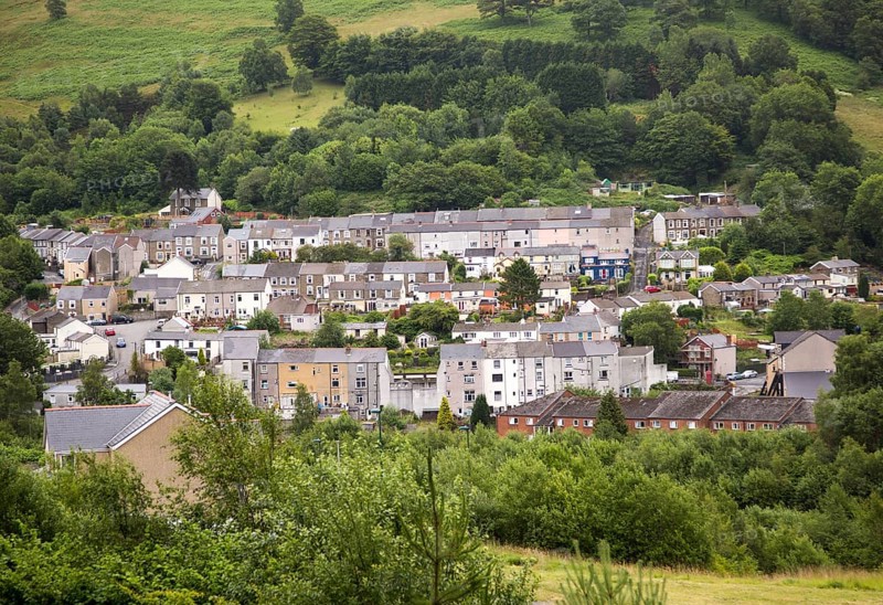 Terraced housing on hillside, at Six Bells, Abertillerry, Blaenau Gwent, South Wales, UK