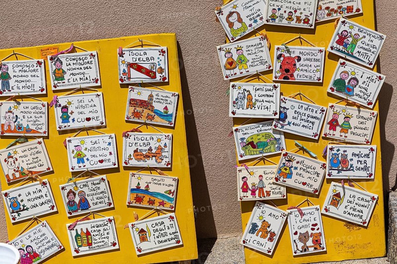 Souvenir boards with Italian sayings, Capoliveri, Elba, Tuscan Archipelago, Tuscany, Italy, Europe