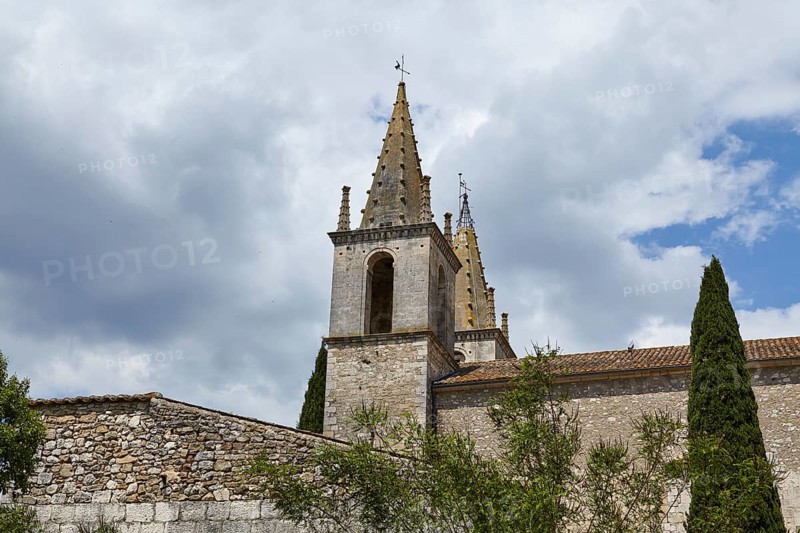 Church tower of L'Abbatiale de Goudargues in Goudargues, Departement Gard, Occitanie region, France, Europe
