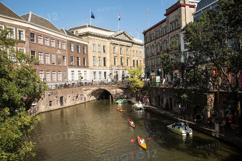People kayaking near the Stadhuis, Oudegracht canal, Utrecht, Netherlands
