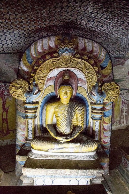 Buddha figure inside Dambulla cave Buddhist temple complex, Sri Lanka, Asia