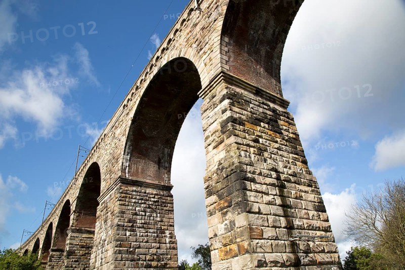 Stone arches of railway viaduct crossing River Tweed, Berwick-upon-Tweed, Northumberland, England, UK