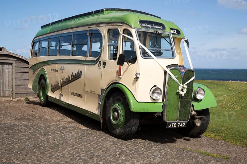 Antique motor coach seen on Holy Island, Lindisfarne, Northumberland, England, UK