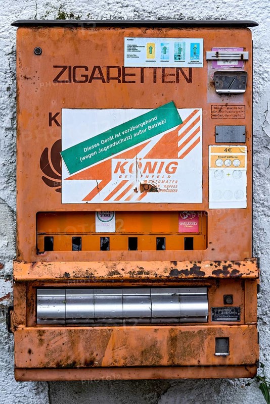 Rotten, rusty cigarette vending machine, device temporarily out of service due to youth protection, on a wall, protection, children, youth, Germany, Europe