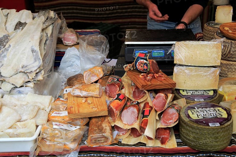 Display of fish, meat and cheese products on market stall, Algeciras, Spain, Europe
