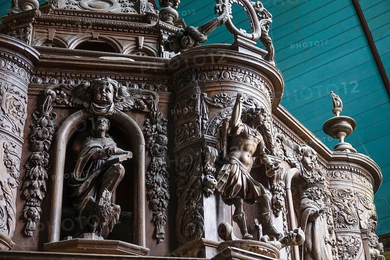 Renaissance-style carved canopy of the baptismal font, Enclos Paroissial enclosed parish of Guimiliau, Finistere Penn ar Bed department, Brittany Breizh region, France, Europe