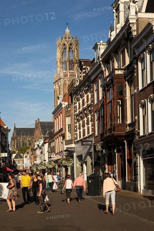 Historic buildings and famous fourteenth century Dom church tower in city of Utrecht, Netherlands