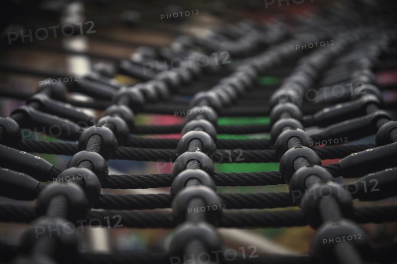 Detailed view of a rope net on a children's playground with bokeh effect, Wuppertal Elberfeld, North Rhine-Westphalia, Germany, Europe