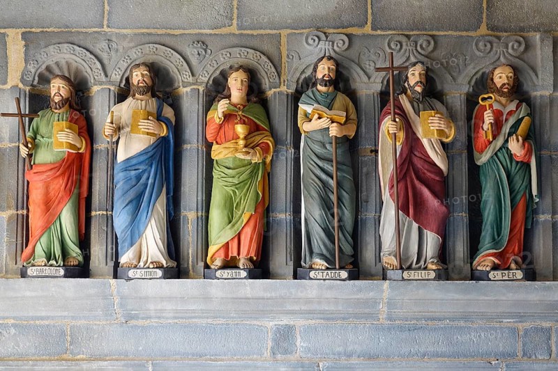 Six statues of saints in a restored version in front of the entrance to the Saint-Sauveur church on the Riviere du Faou on the Rade de Brest, Le Faou, Finistere department, Brittany region, France, Europe