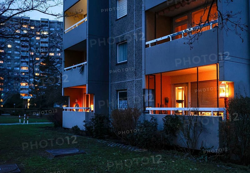 Illuminated balconies on a tower block in Gropiusstadt. The rise in rents in German cities increased again last year, Berlin, 16.01.2023